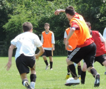(Exhibit B.) Taken during a charity match earlier this summer. Oh, and there's the weird arm motion AGAIN!